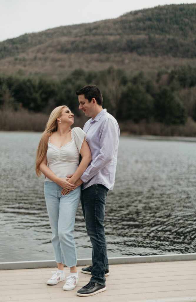 Engagement Session at Kenneth L. Wilson Campground. Woodstock, NY. couple walking away from camera. beautiful landscape, couple smiling