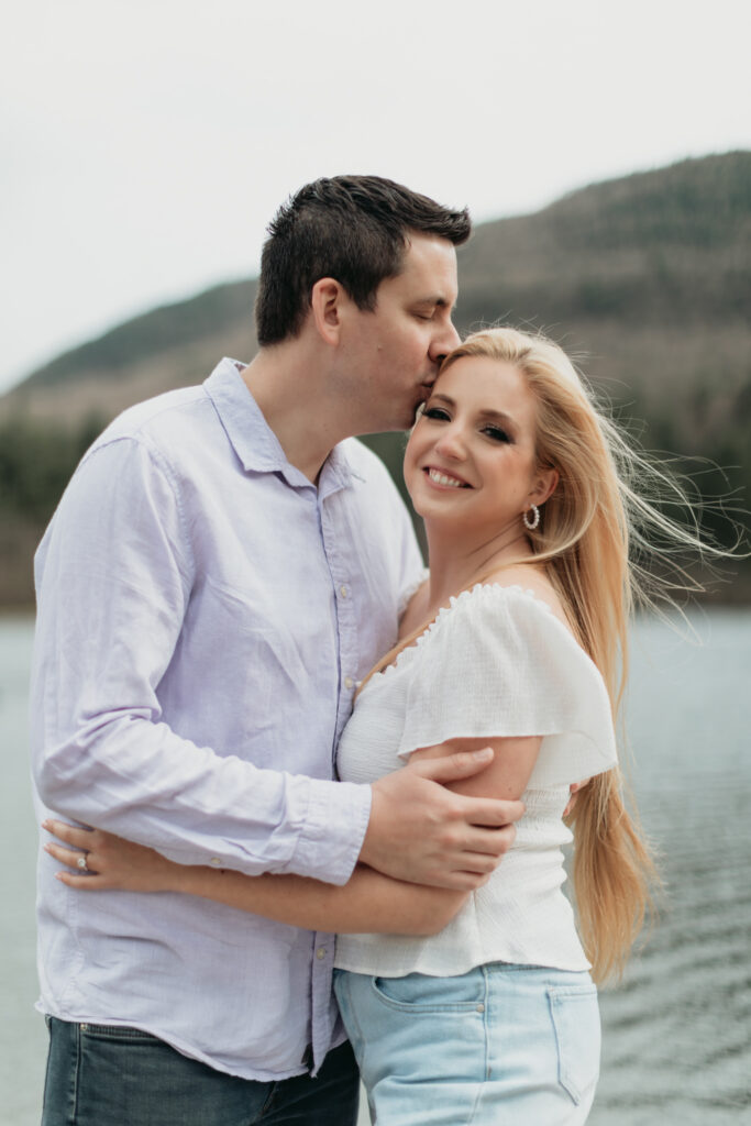 Engagement Session at Kenneth L. Wilson Campground. Woodstock, NY. couple walking away from camera. beautiful landscape, couple shares a kiss.