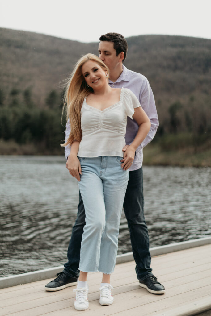 Engagement Session at Kenneth L. Wilson Campground. Woodstock, NY. couple walking away from camera. beautiful landscape. couple kissing, smiling