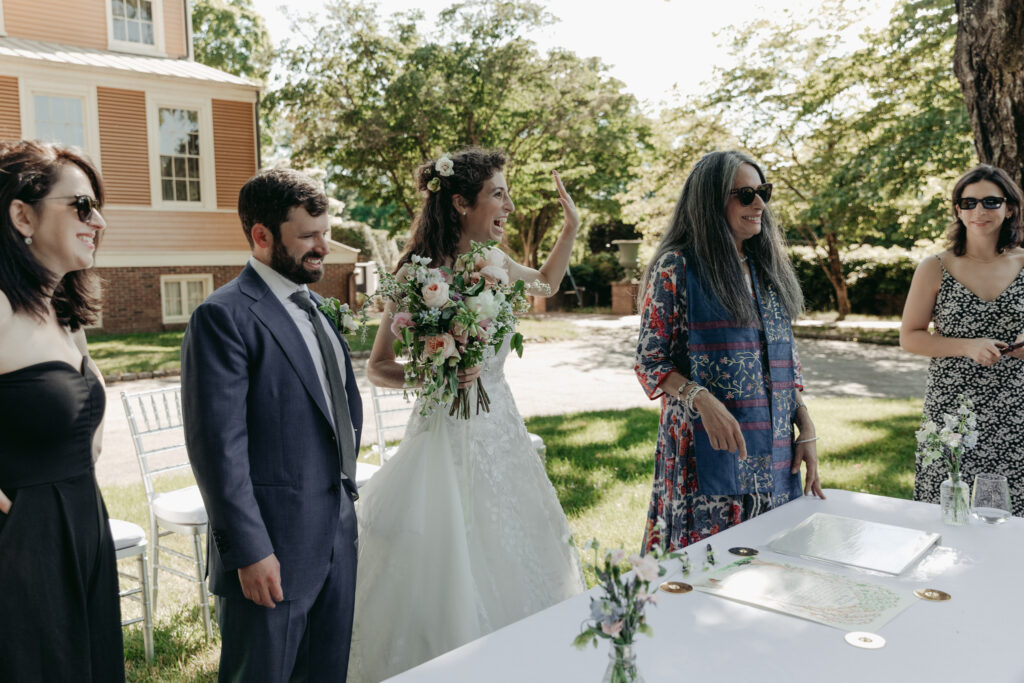 moments from the Ketuba signing at Boscobel House and Gardens Cold Spring New York Hudson Valley Simplicity in Mind Floral Design