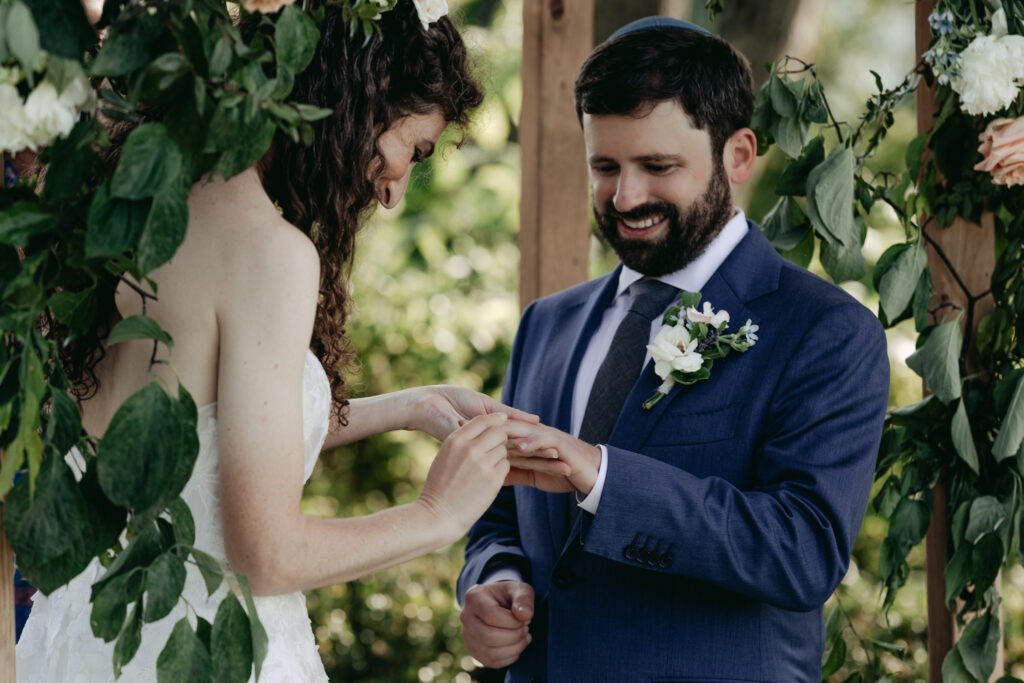 Jewish wedding ceremony at Boscobel House and Gardens Cold Spring New York Hudson Valley close up of rings