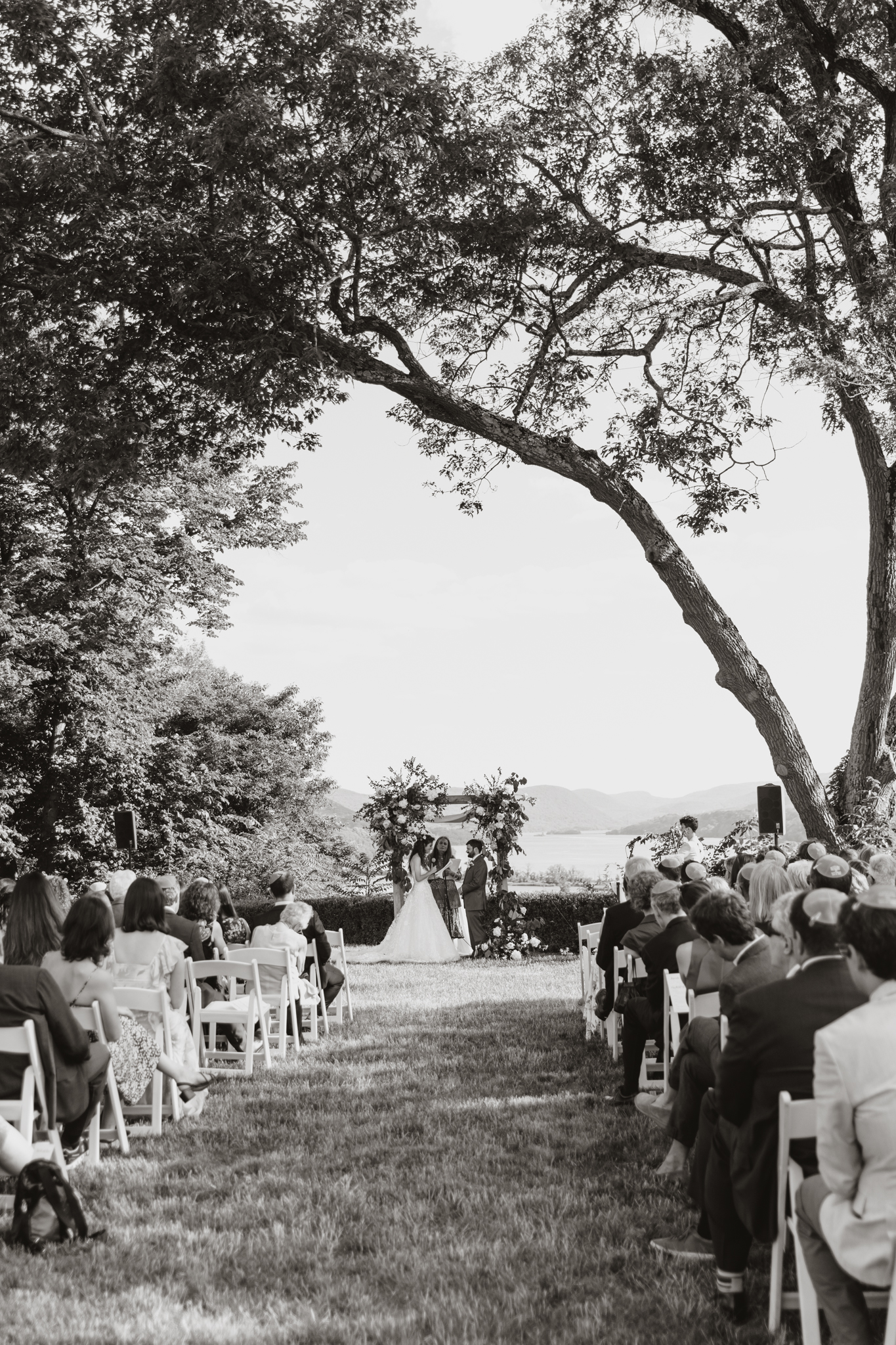 black and white image of couple saying wedding vows at boscobel house and gardens cold spring new york hudson valley