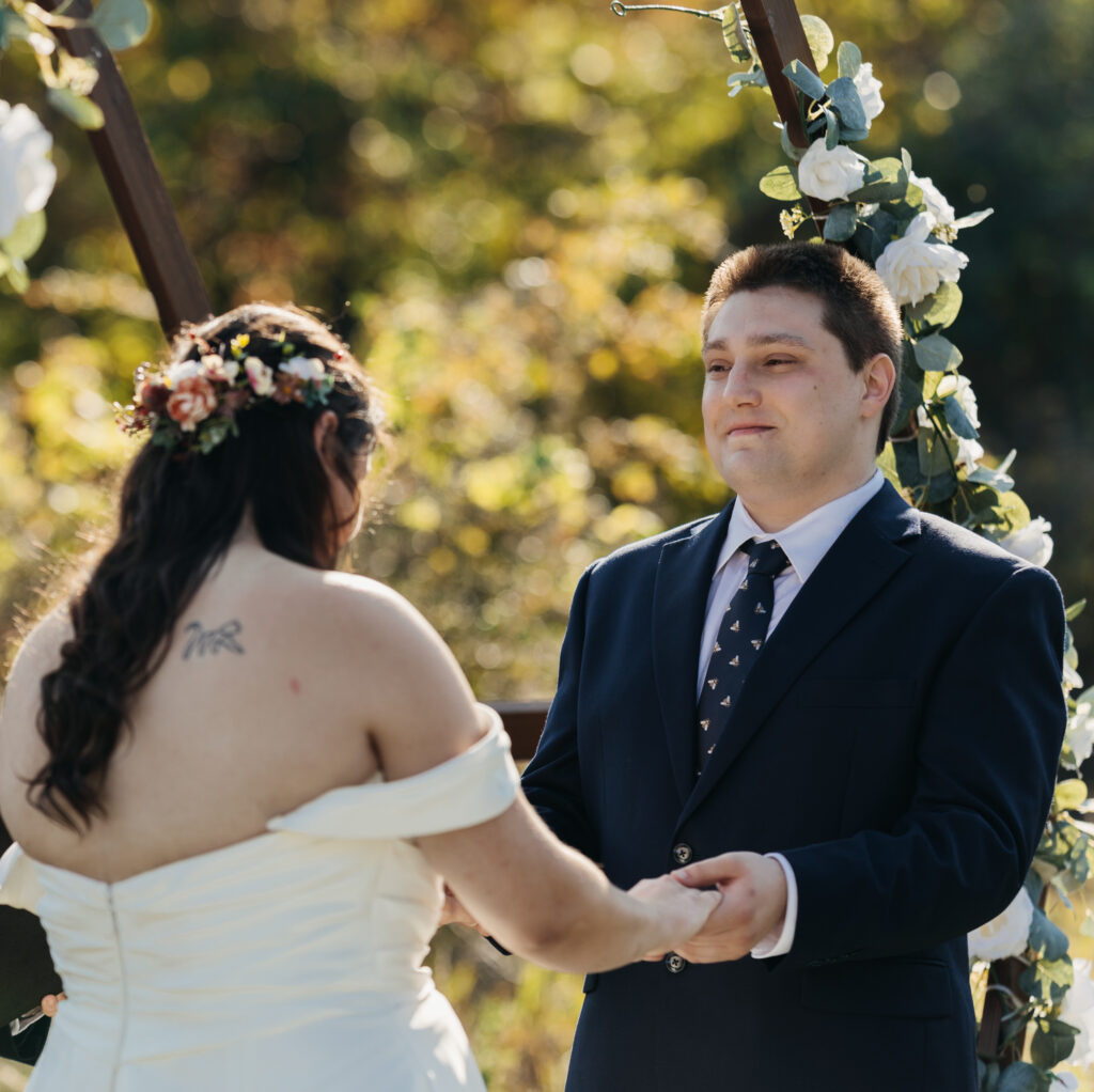 groom looking lovingly and emotionally at his bride