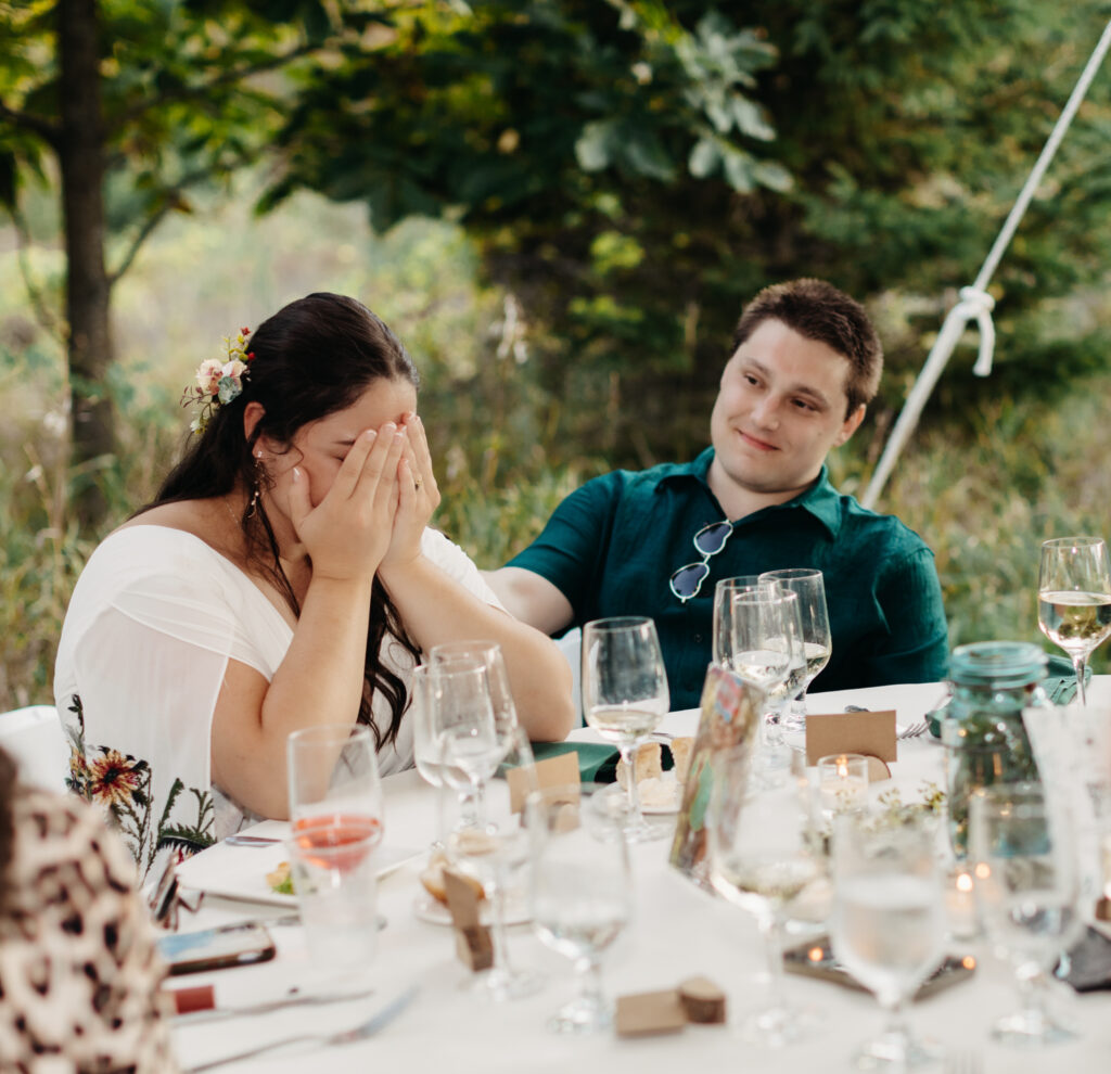 bride becomes emotional during her father's speech